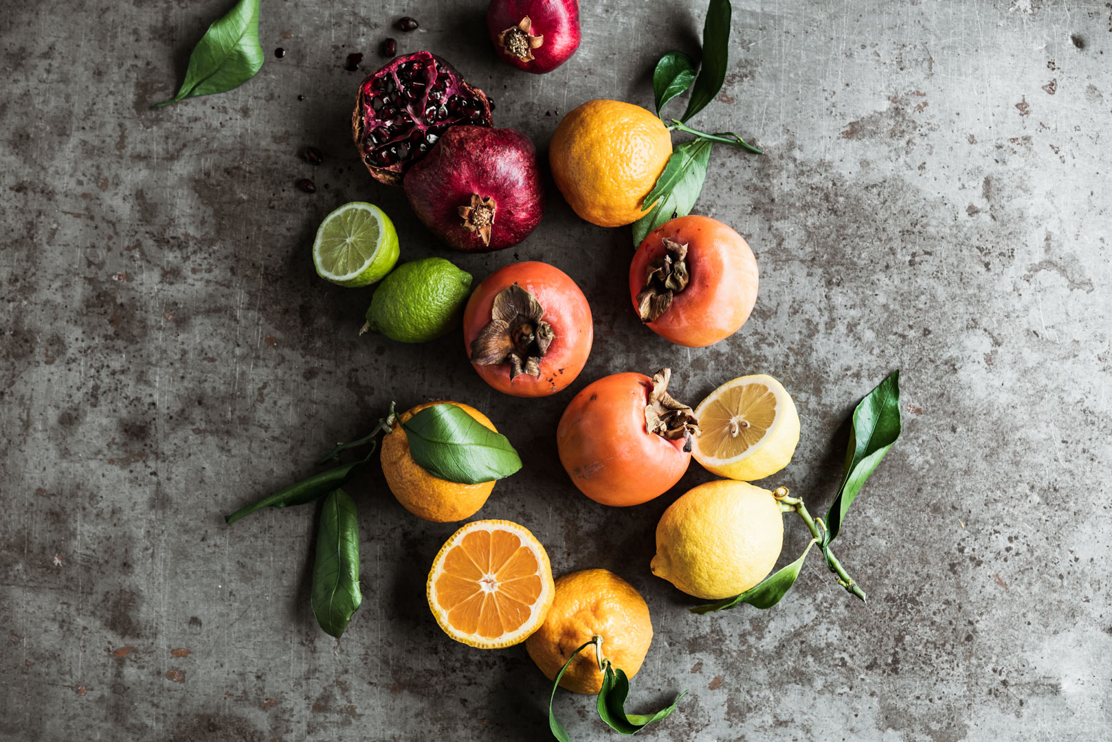 WINTER GREEK SALAD ingredients: 
persimmon, pomegranate & citrus