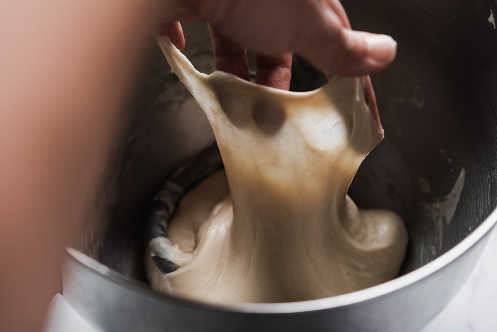 Sourdough Japanese Milk Bread dough at windowpane stage of mixing