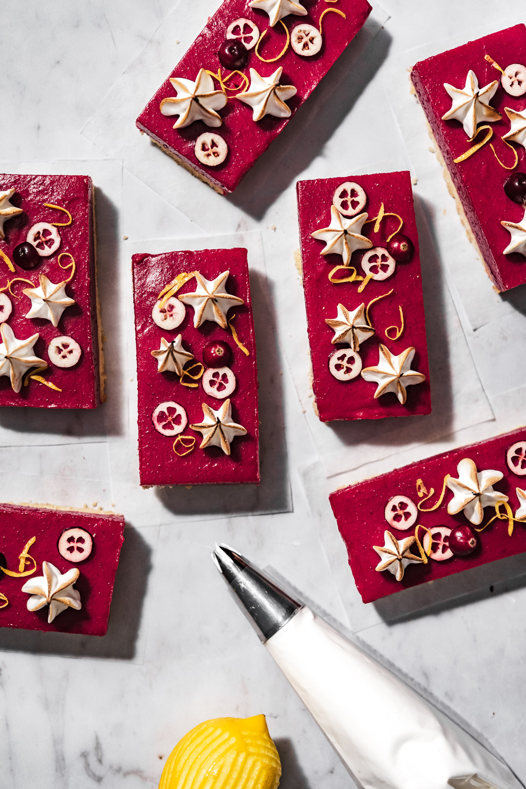 If you are a lemon bar fan, then you will love this cranberry version! These perfect cranberry bars are a simply beautiful addition to your holiday baking!