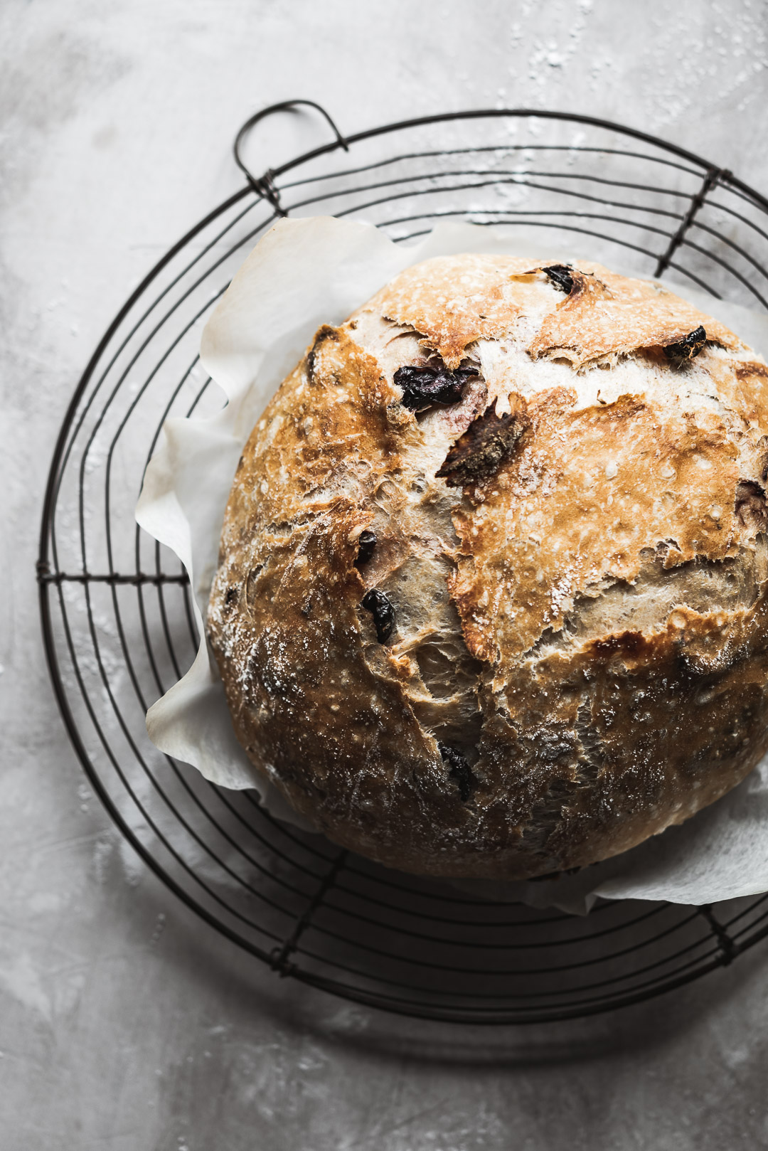 With a crisp crust and a tender interior flavored with Greek oregano and salt-cured Greek olives, this no-knead Greek olive bread recipe reaps a huge reward for little effort. 