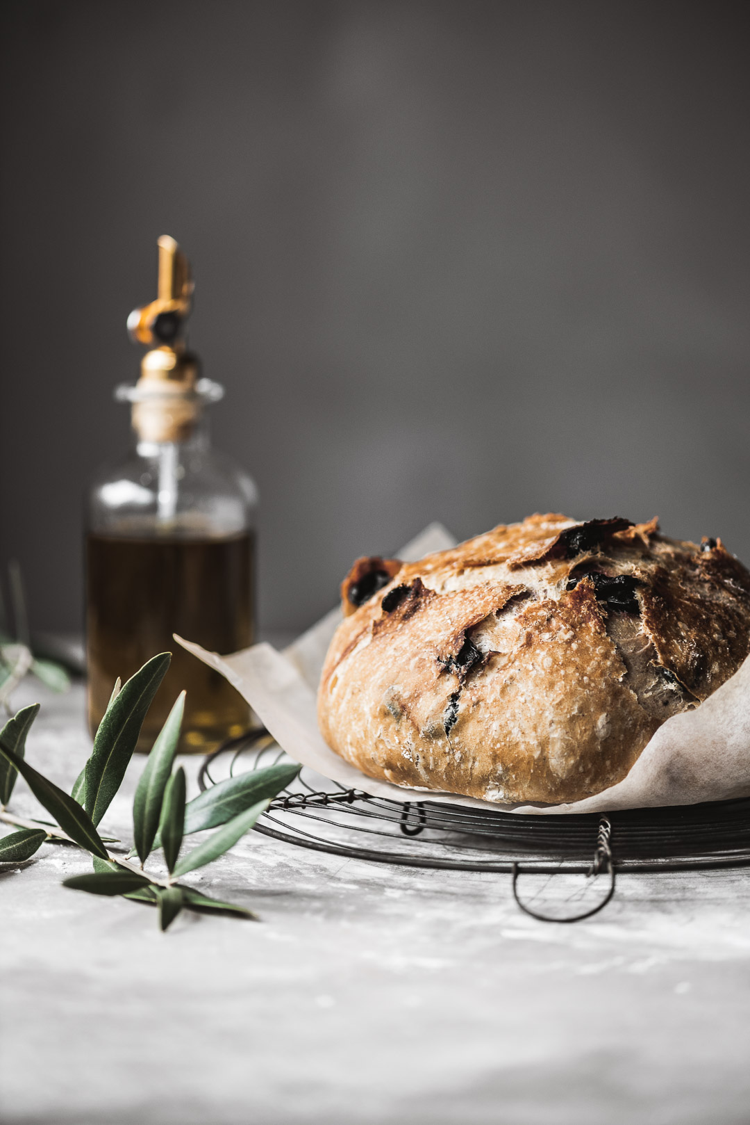 With a crisp crust and a tender interior flavored with Greek oregano and salt-cured Greek olives, this no-knead Greek olive bread recipe reaps a huge reward for little effort. 