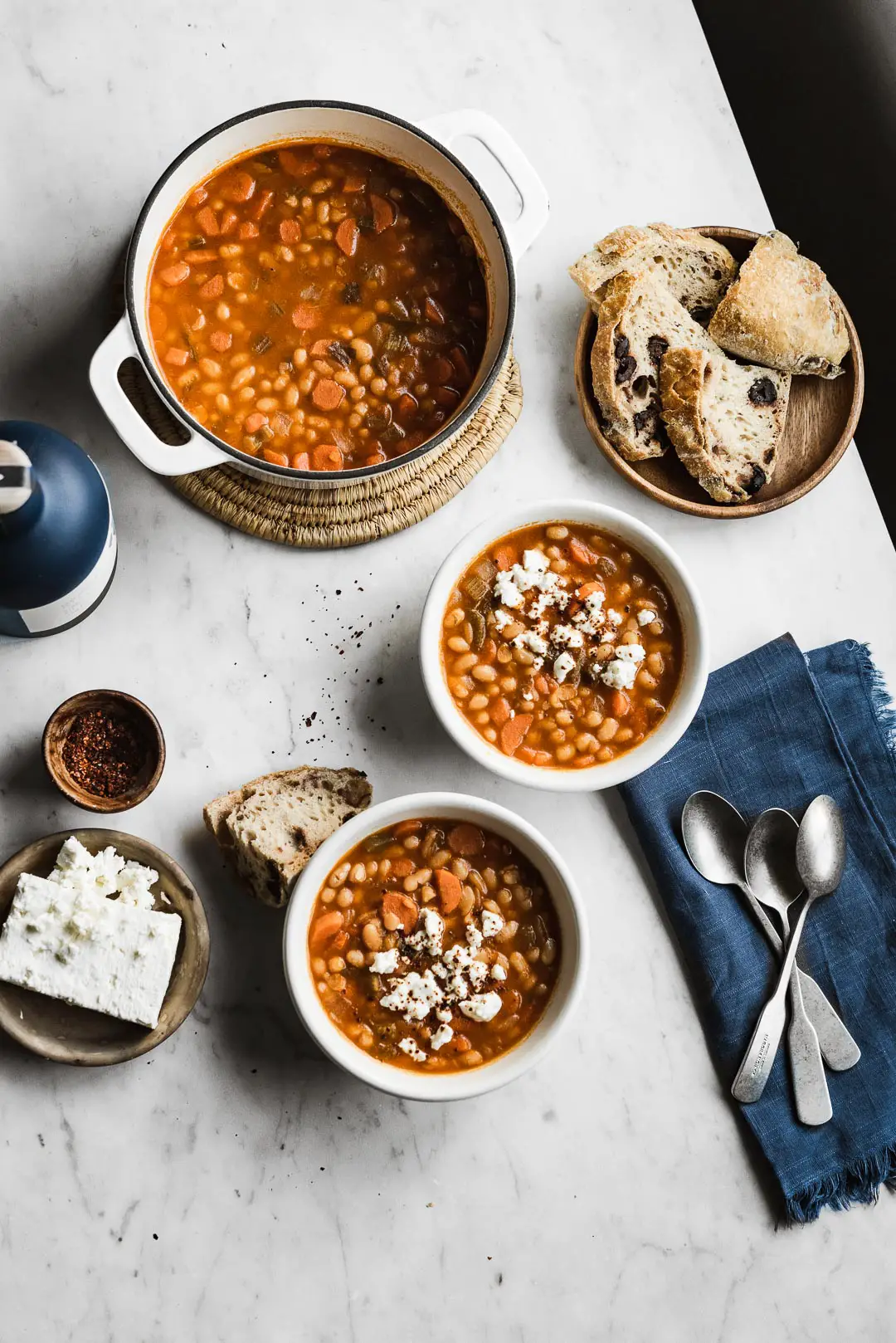 One of the most beloved Greek recipes, Fasolada - Greek White Bean Soup is a simple, nourishing comfort food that pairs beautifully with a bit of crumbled feta, olives, and crusty bread. 