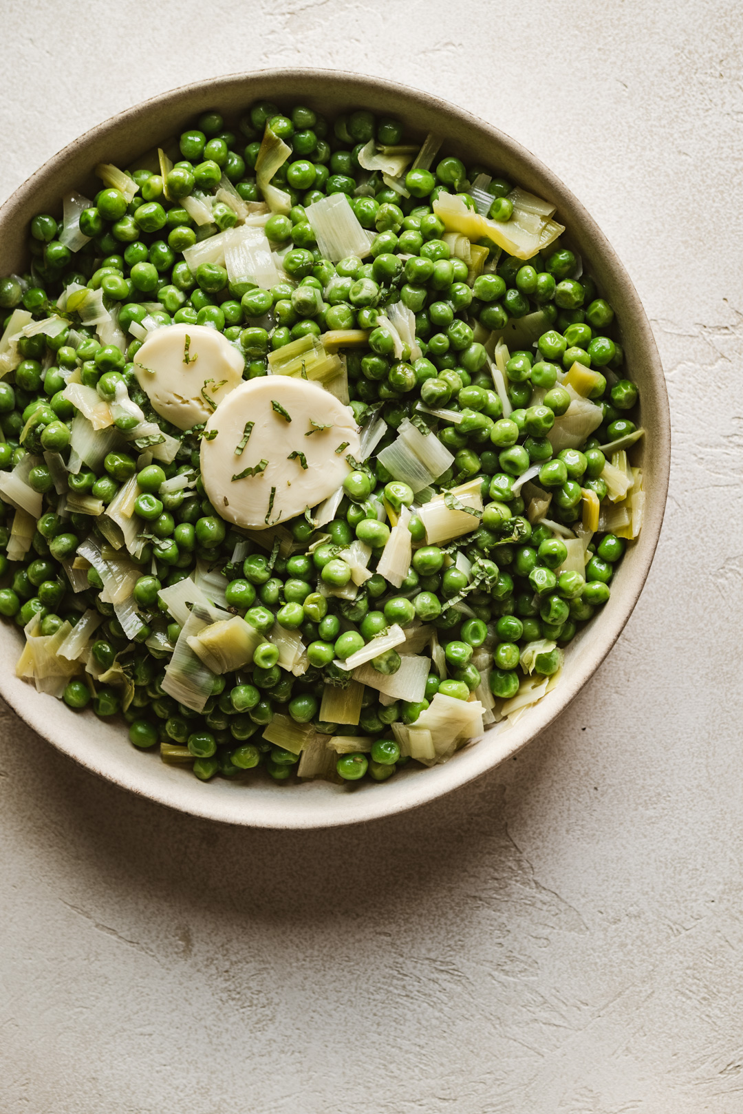 While this recipe for buttered peas with leeks and mint may be simple, it truly is the perfect way to eat peas.