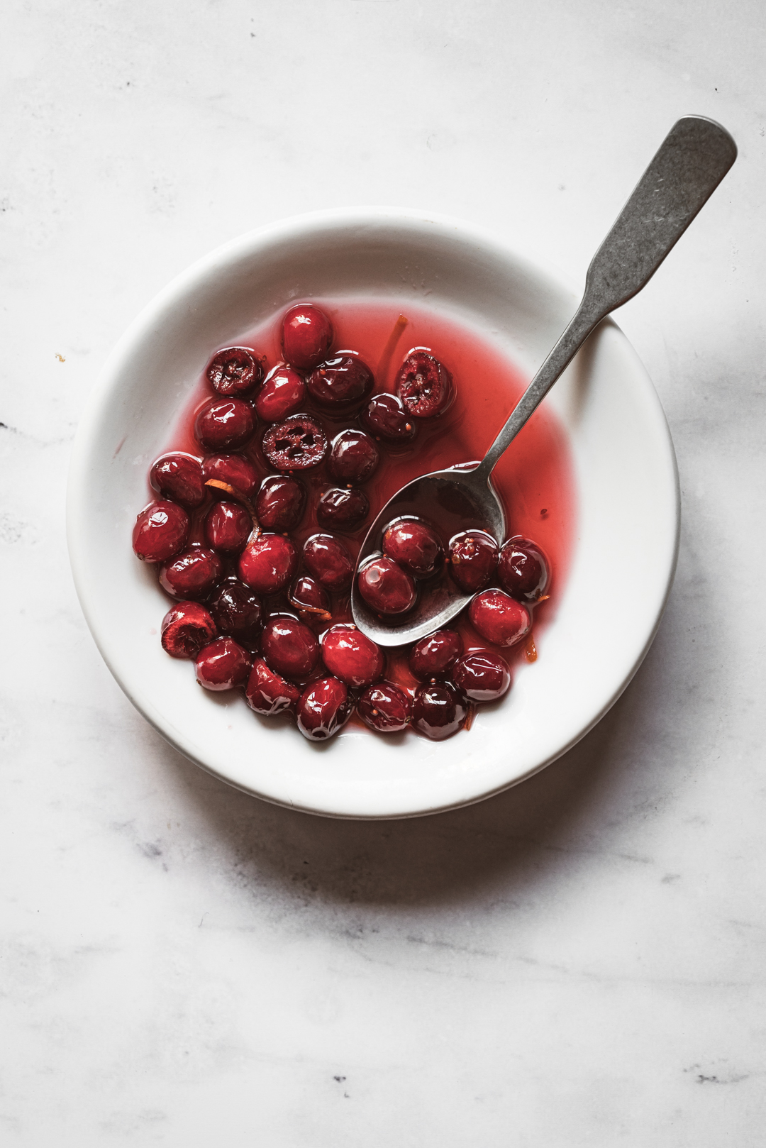 These soft candied cranberries are the most beautiful and delicious preparation of whole cranberries - a gorgeous & festive garnish