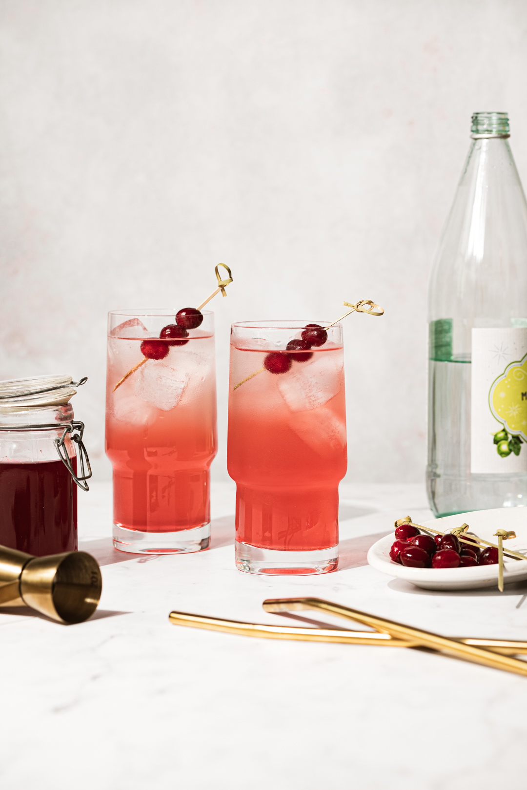 A sweet fizzy treat that is perfect in its simplicity, these candied cranberry Shirley Temples are my grown up version of the classic drink.