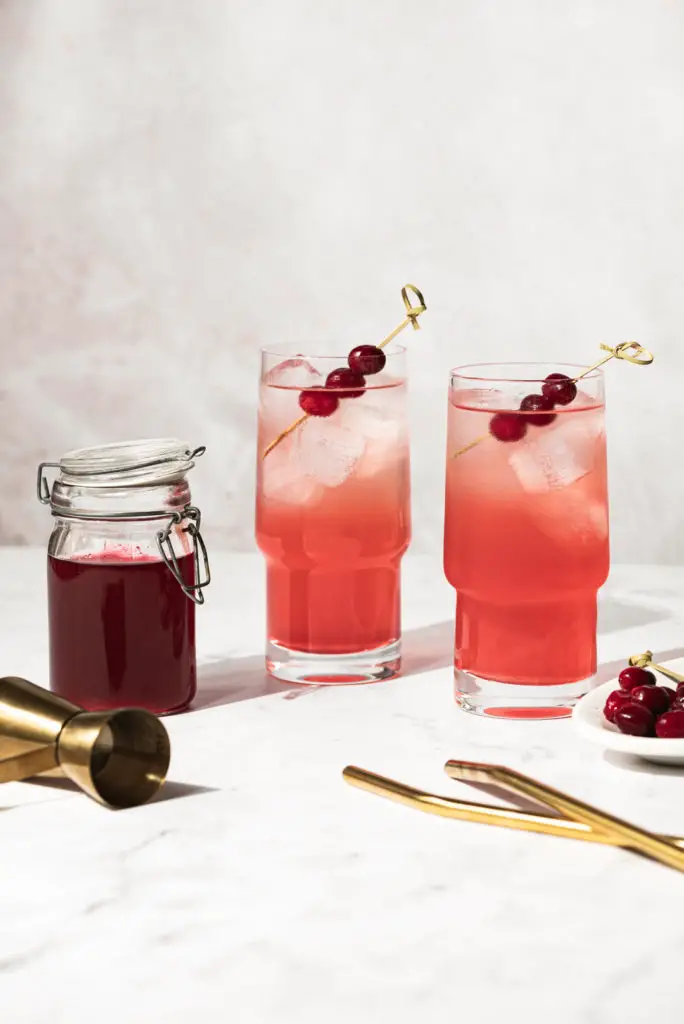 A sweet fizzy treat that is perfect in its simplicity, these candied cranberry Shirley Temples are my grown up version of the classic drink.