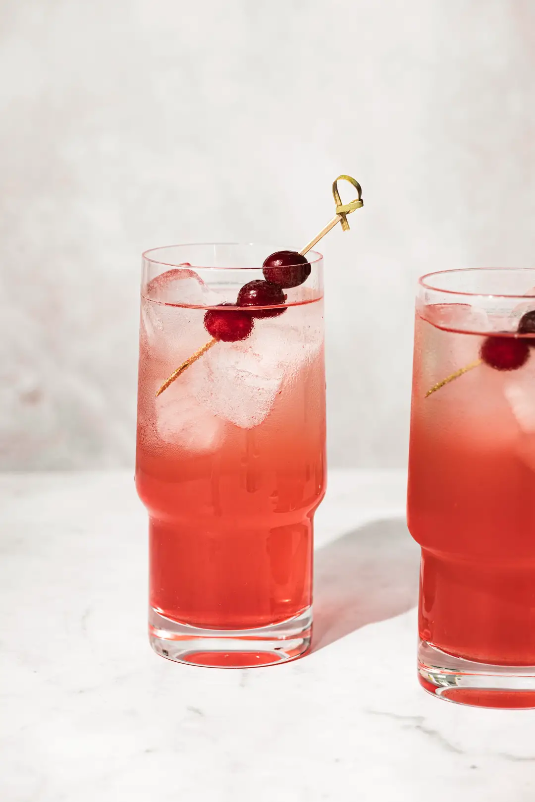 A sweet fizzy treat that is perfect in its simplicity, these candied cranberry Shirley Temples are my grown up version of the classic drink.