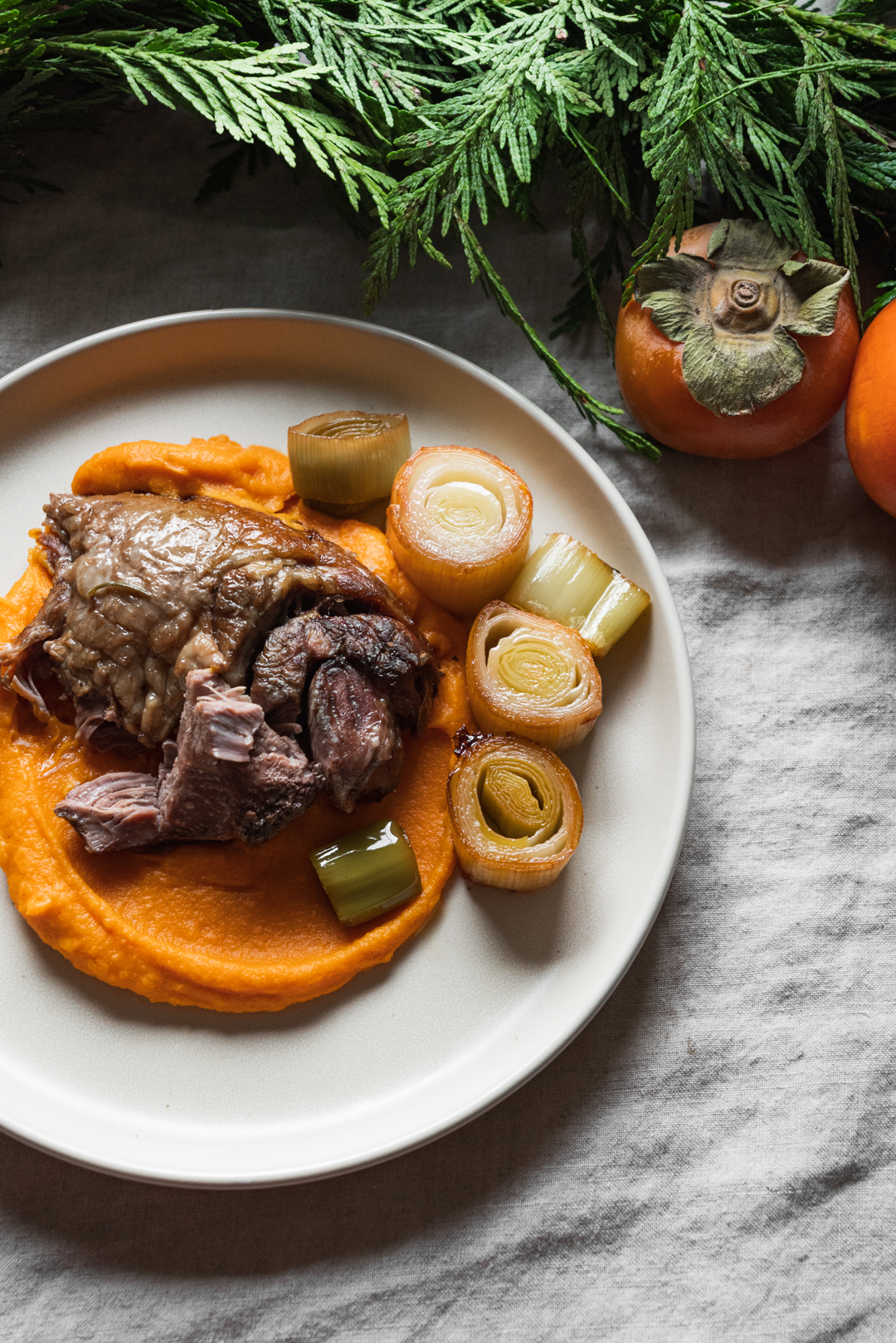 Slow Braised Leg of Lamb with Leek Confit & Sweet Potato Puree
